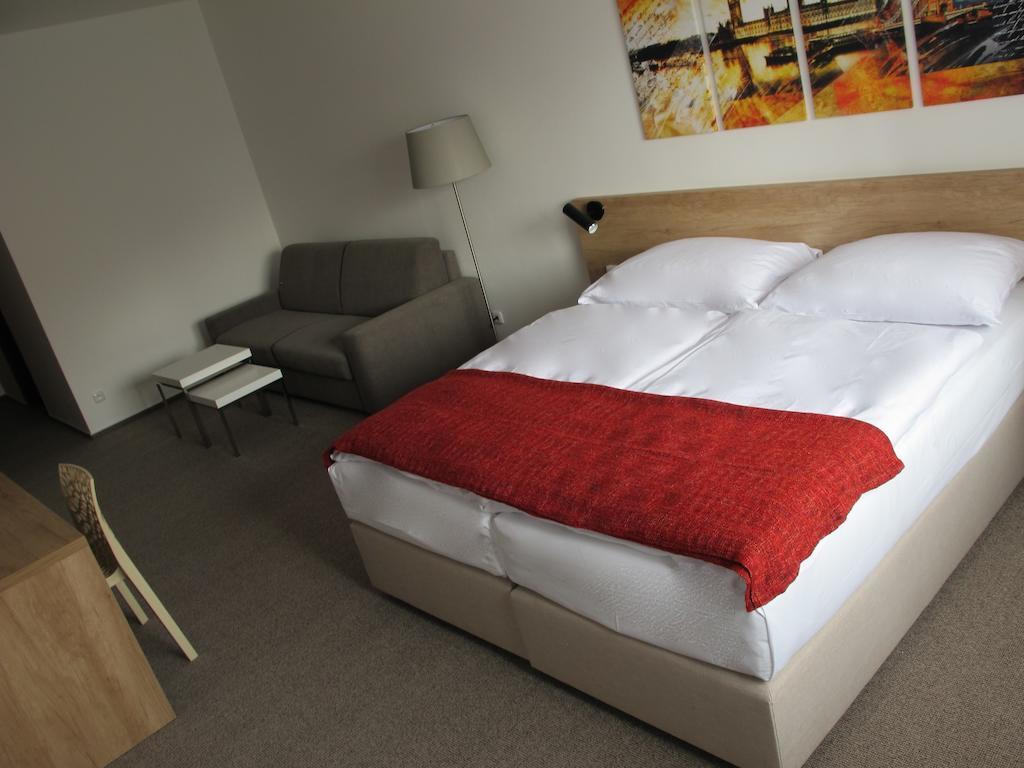 Hotel Kapitol Most Quarto foto