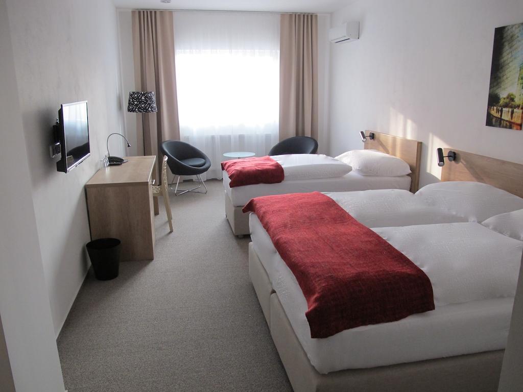 Hotel Kapitol Most Quarto foto